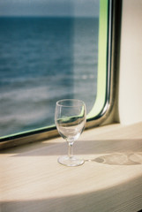 Glass of wine on a ship