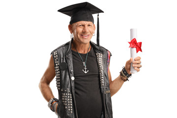 Mature punk man with a college diploma smiling at the camera