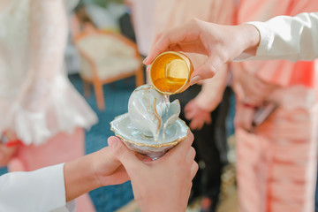 The Wedding Holy Water Pouring Ceremony.