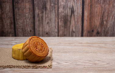 Mid-Autumn Festival moon cake on wooden background