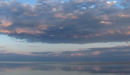 low clouds and quiet sea surface