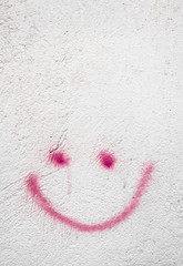 Grungy smiley on wall