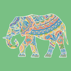 Vector silhouette of adult elephant, side view. Big elephant in motion. Colorful elephant in ethno style. A festive elephant on a white background. The silhouette is drawn manually.