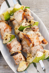 Shish kebab with vegetables. Grill meat and vegetables