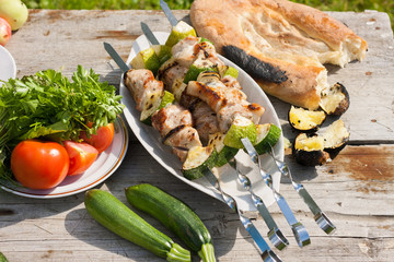 Shish kebab with vegetables. Grill meat and vegetables