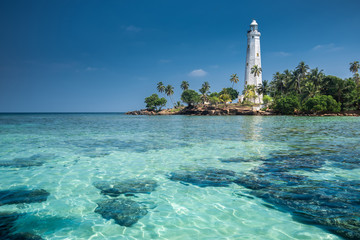 Lighthouse and beautiful beach landscape in Sri Lanka - obrazy, fototapety, plakaty