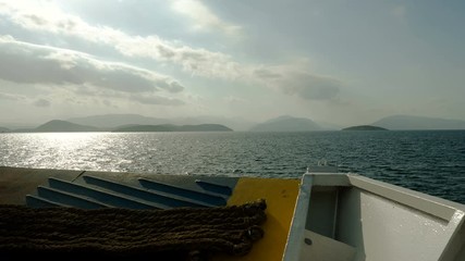 View from bow of boat. Landscape of Mediterranean coast in Greece. 4K