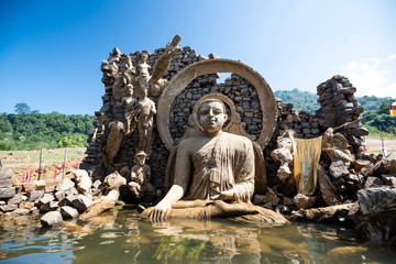Fototapeta na wymiar Buddha ruins in temple in Sri Lanka