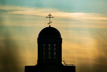 Church silhouette on a summer sunset background.