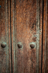old wooden door with beautiful metal elements
