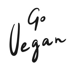 Hand drawn phrase Go Vegan. Vector illustration
