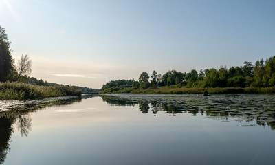Beautiful morning fog on the lake. Forest, lake,  in the fog. Mysterious fog