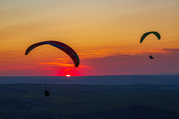 Paragliders and sunset. Mineralnye Vody resort. Russia