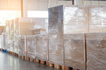 goods pallets in storage warehouse, cargo export shipment transportation.
