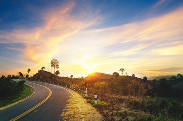 The beauty of the road that curves along the hill, the sunset at the top of the mountain, Nan Thailand