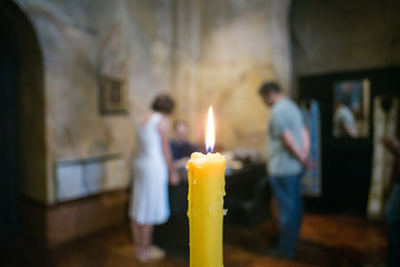Couple taking wedding vows in church