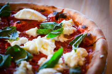 tasty italian pizza with fresh ingredients & vegetables