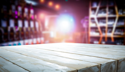 White wooden table background with blurred pub view.