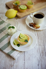 lime tartlet with coffee
