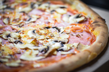 tasty italian pizza with fresh ingredients & vegetables