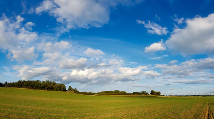 scenic panorama view of natural landscape under a cloudy sky