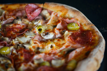 tasty italian pizza with fresh ingredients & vegetables