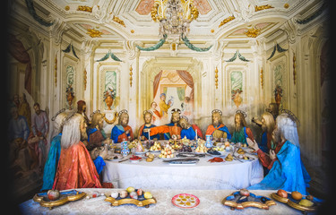 biblical scene representation (presepe) of the Last Supper of Jesus Christ Sacro Monte di Varallo, Piedmont, Italy, - obrazy, fototapety, plakaty