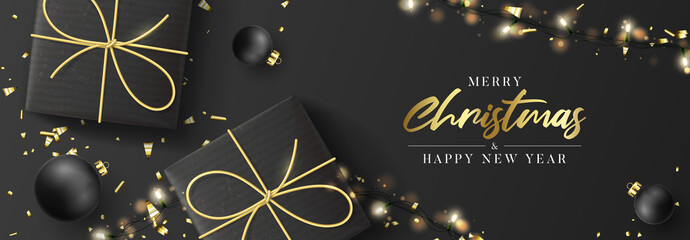 Merry Christmas and Happy New Year horizontal banner. Holiday background with realistic black gift boxes and sparkling light garland. Vector illustration with balls and golden confetti.