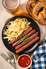 Sausage, sauerkraut, bretzels and beer.