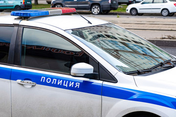 Police car. Russian patrol car, the inscription police.