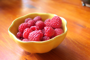 Ripe raspberries in a bowl