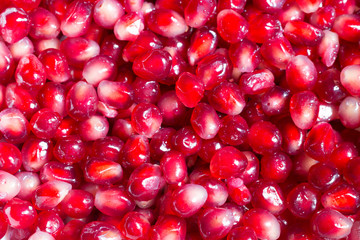 Pomegranate seeds background. Close-up. Raw foods. Top view. Full frame.
