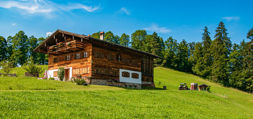 Beautiful alpine view with a wooden house at Oberstdorf, Bavaria, Germany
