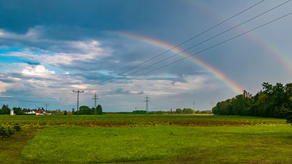 Fototapeta na wymiar Beautiful double rainbow at Tabertshausen, Bavaria, Germany