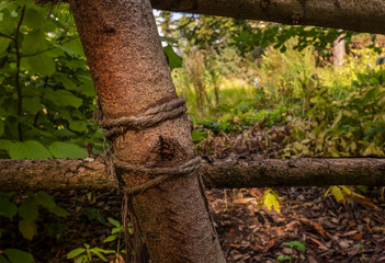 A simple fence of sticks and coarse rope