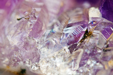 Crystals. Structure of the stone. Beautiful background from purple natural material. Macro