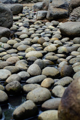 Beautiful naturally rounded stones in the dry pond