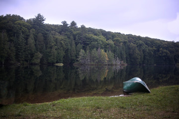 canoe on lake shore