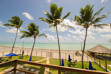 Ilha de Itamaraca, Brazil - Circa December 2018: View to a turquoise sea from the balcony of an...