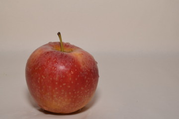 Red small apple isolated on white background