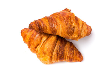 two croissants on a white background