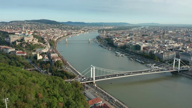 day view of Budapest flying backward revealing Liberty Statue