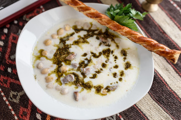 Turkish traditional hot yoghurt soup, Yuvalama Corbasi.