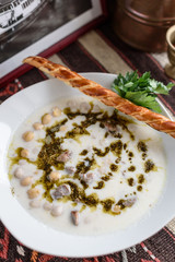 Turkish traditional hot yoghurt soup, Yuvalama Corbasi.
