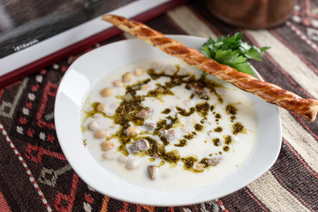 Turkish traditional hot yoghurt soup, Yuvalama Corbasi.