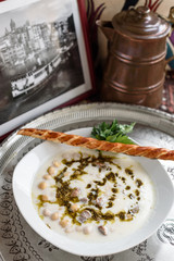 Turkish traditional hot yoghurt soup, Yuvalama Corbasi.