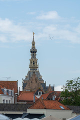 Fototapeta premium View on old Dutch houses and church tower in Zierikzee, historical town in Zeeland, Netherlands