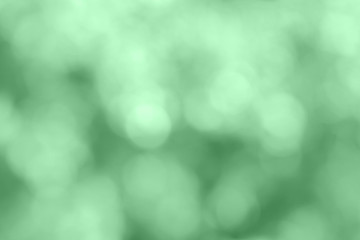 Blurred background in trendy neo mint green, color of the year 2020,