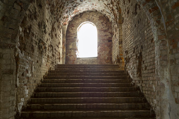 Fototapeta na wymiar Dungeon staircase. Old fort Tarakanivsky,