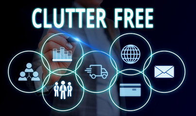 Handwriting text Clutter Free. Conceptual photo Well organized and arranged Tidy All things in right places Woman wear formal work suit presenting presentation using smart device
